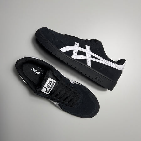 Top and side view of Asics Japan Pro in black suede with white leather logo and black sole.