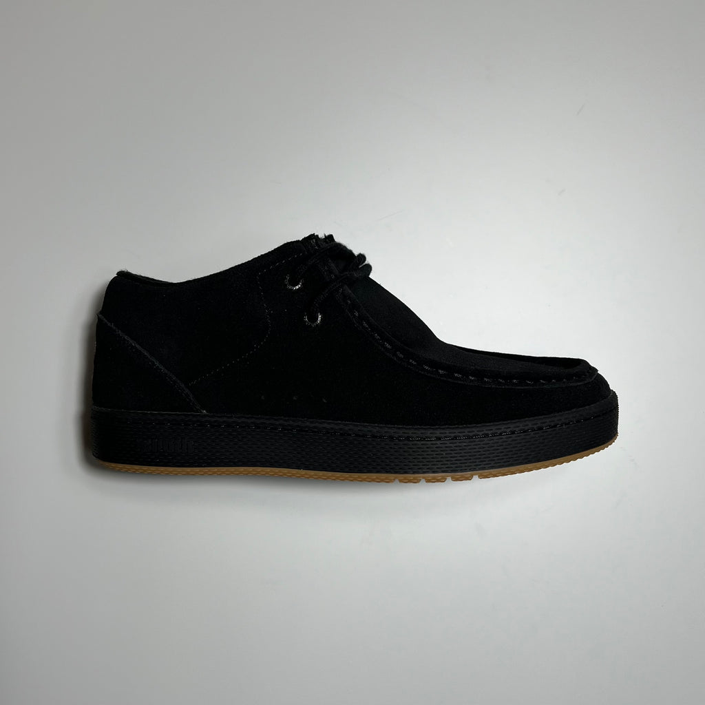 Side view of right shoe. Black suede with black outsole