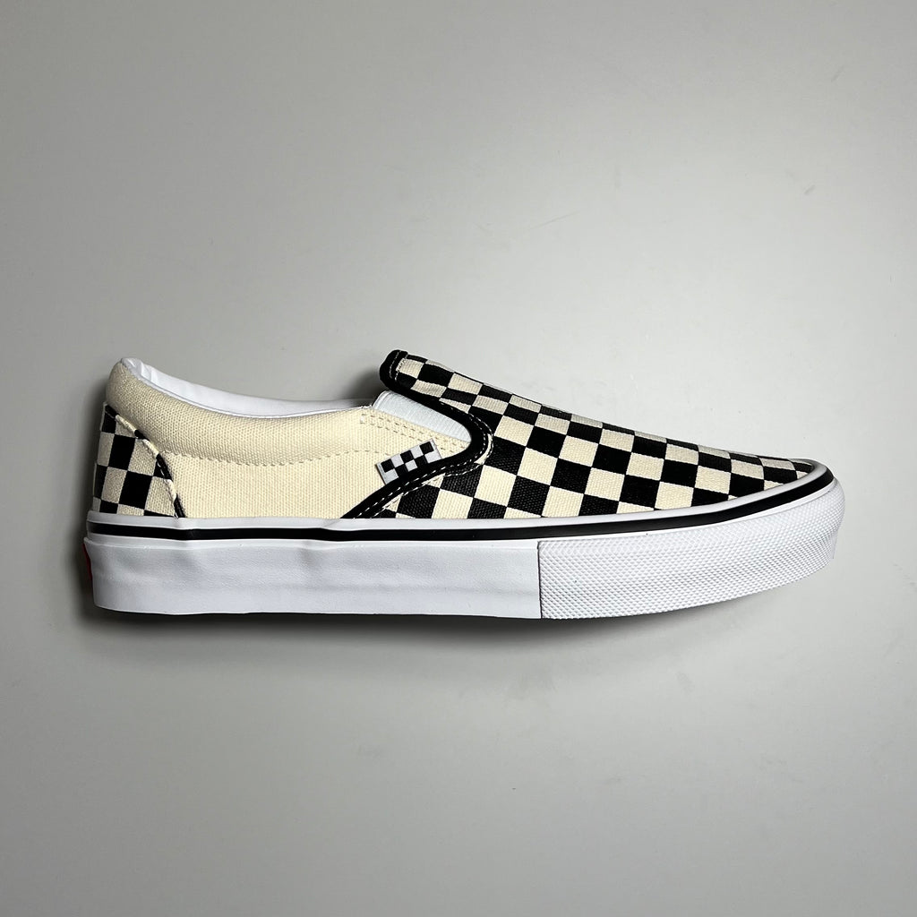 Vans skate slip on in black and white checker and white sole.