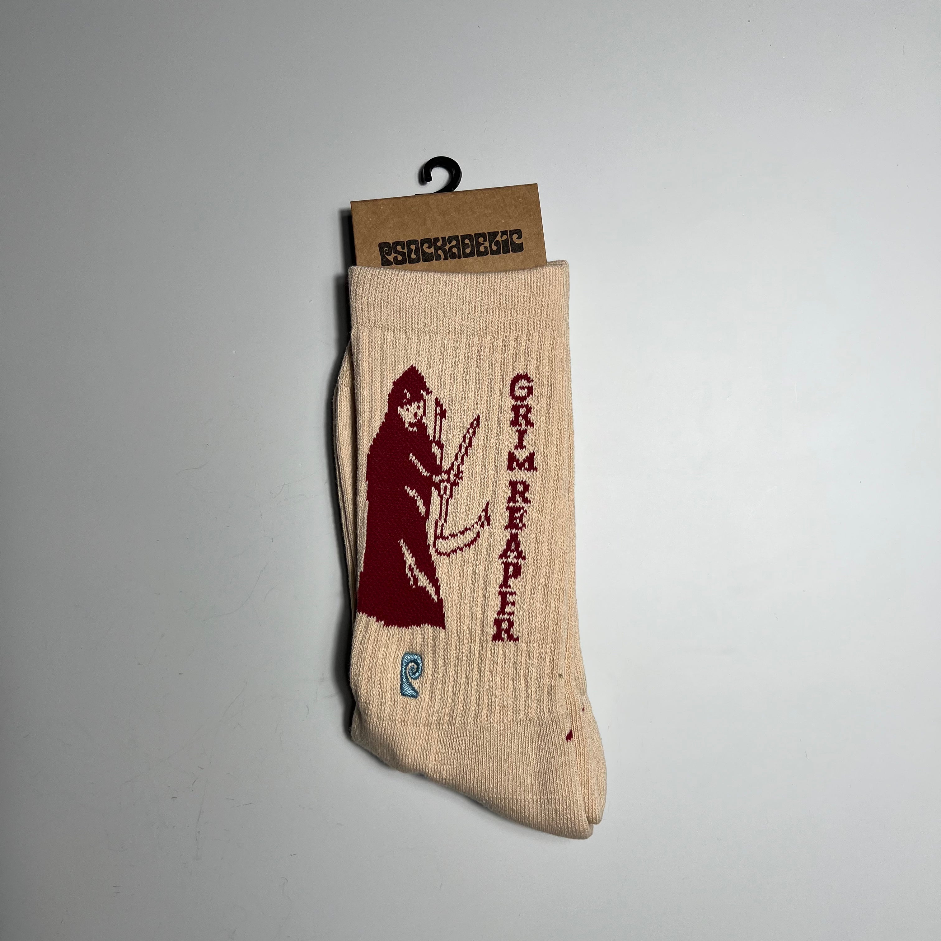 TAN AND RED SOCK WITH GRIM REAPER GRAPHIC