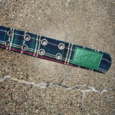 LOOSEY BELT IN BLUE GREEN BLACK WHITE PLAID PATTERN GREEN LEATHER TAG