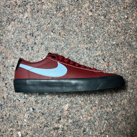 BLAZER LOW GT IN RED LEATHER WITH LIGHT BLUE SWOOSH AND B LACK SOLE