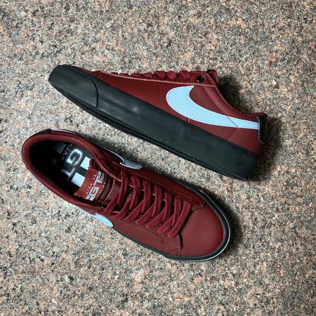 NIKE SB BLAZER LOW GT IN RED LEATHER WITH LIGHT BLUE SWOOSH AND B LACK SOLE