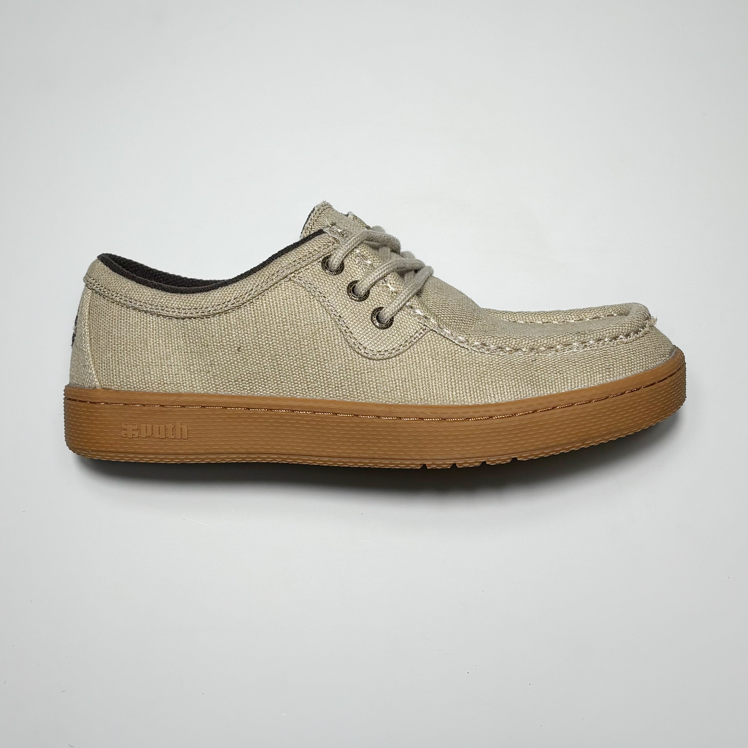 Side image of right shoe.
Natural hemp with gum outsole.