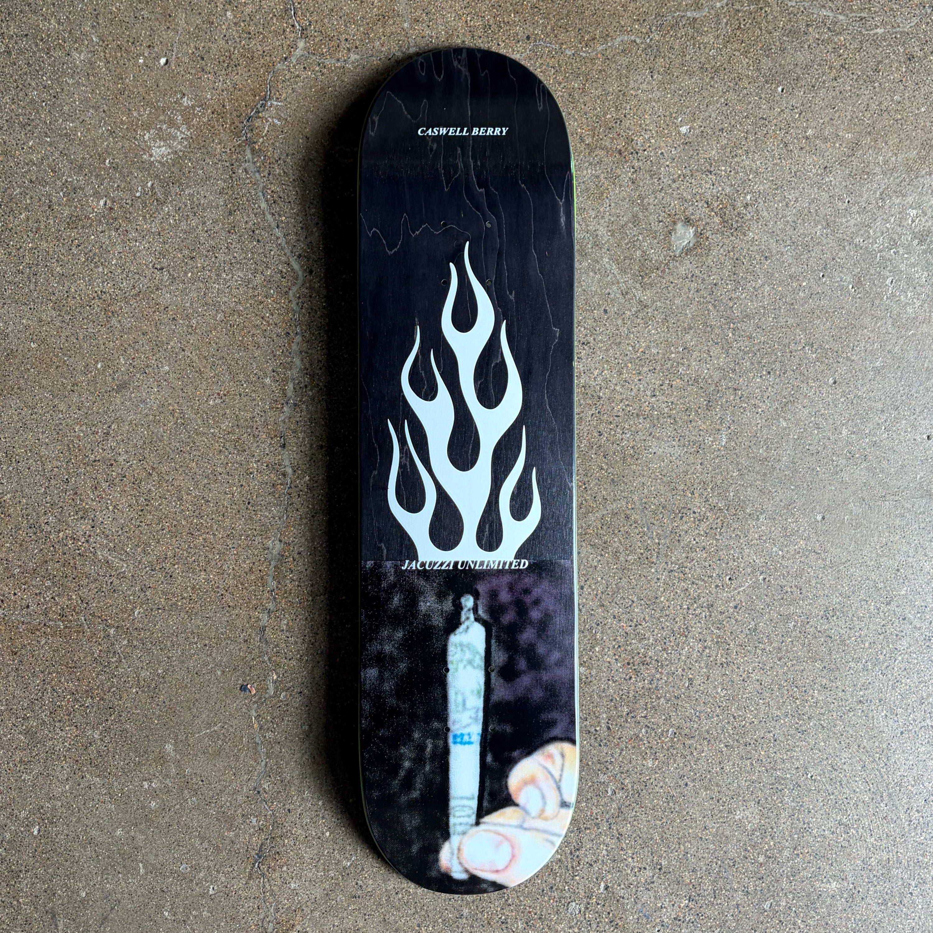 Full image of Jacuzzi skateboard deck.
Cartoon style art of a hand holding a joint with flames above.