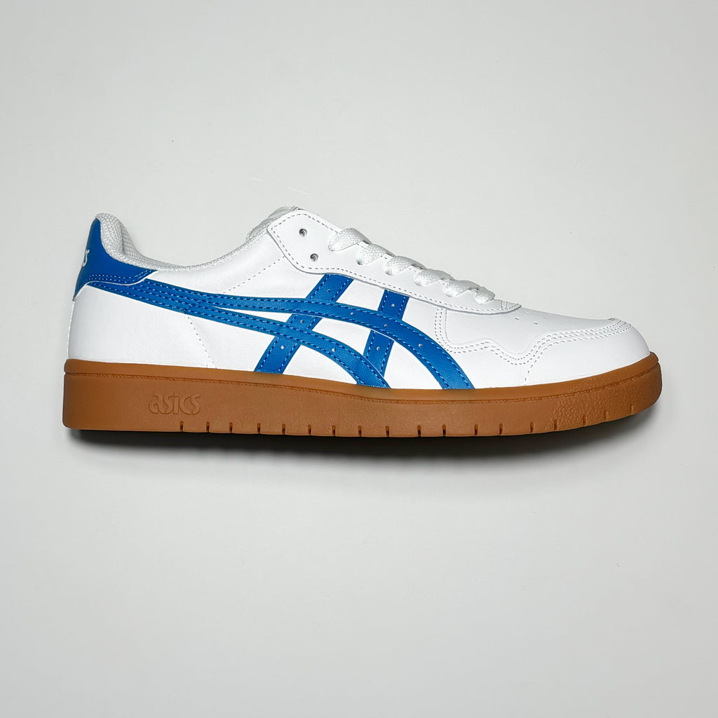 Side image of right shoe. 
White leather with blue logo detail and gum outsole.