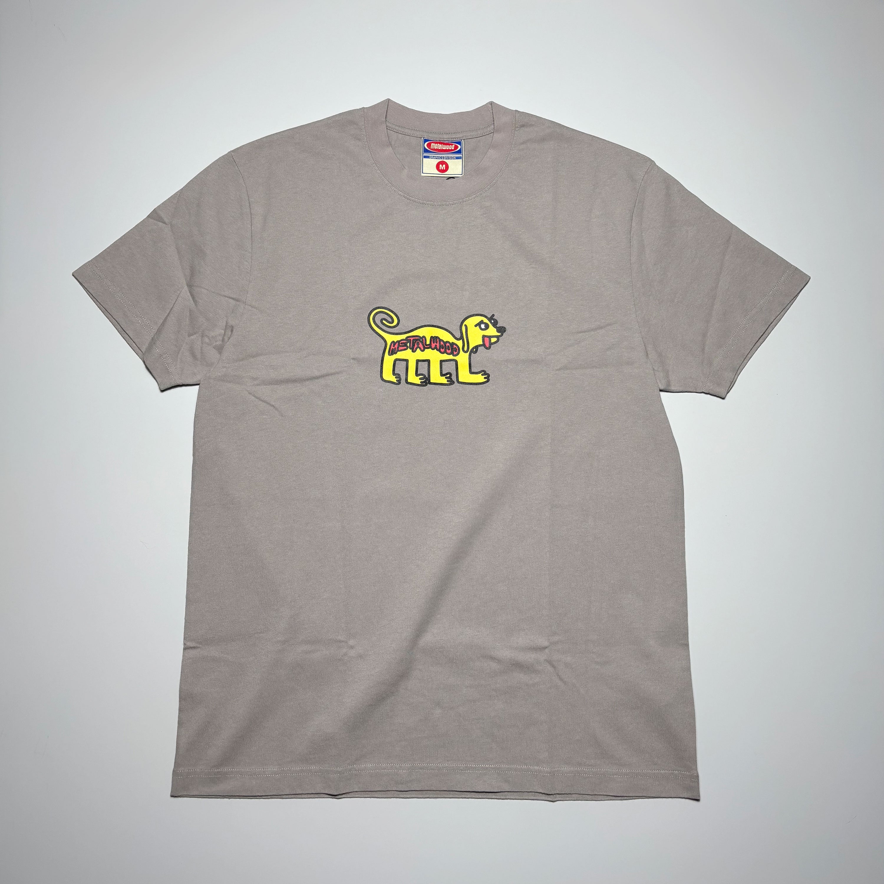 Front image of grey tee with art printed on chest.