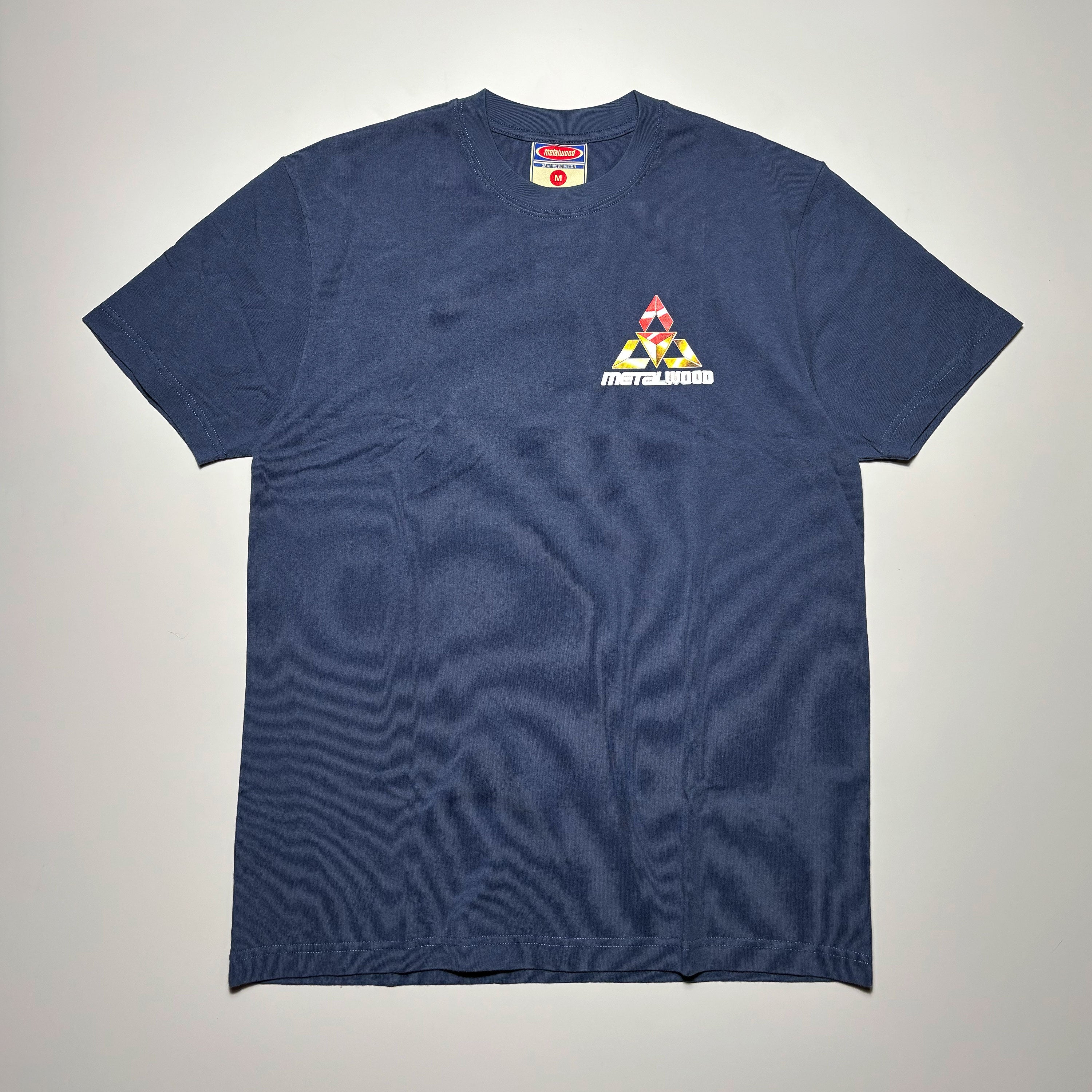 Front image of navy tee with art printed on left chest.