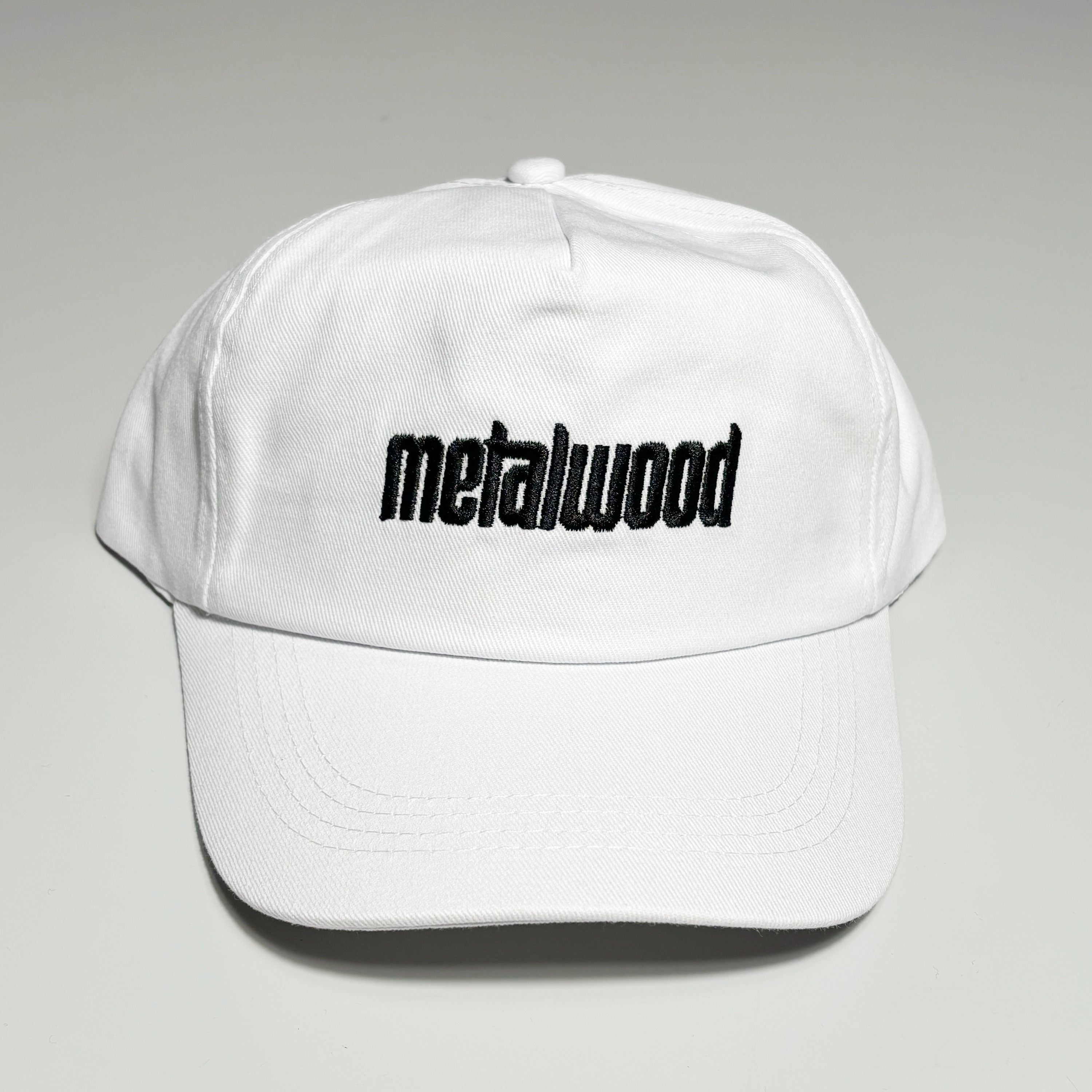 Front image of white hat with black embroidered logo on crown