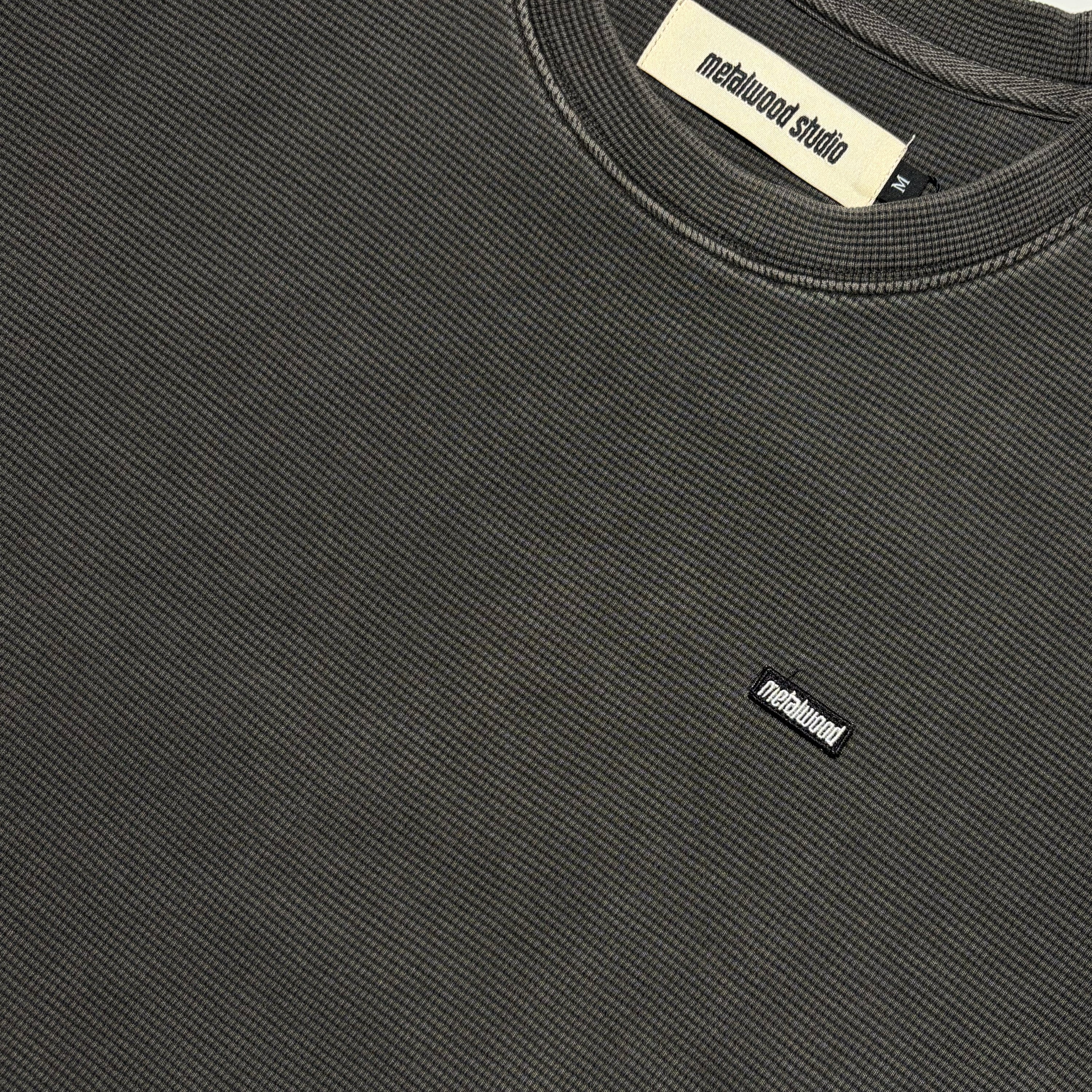 Close detail of embroidered patch.