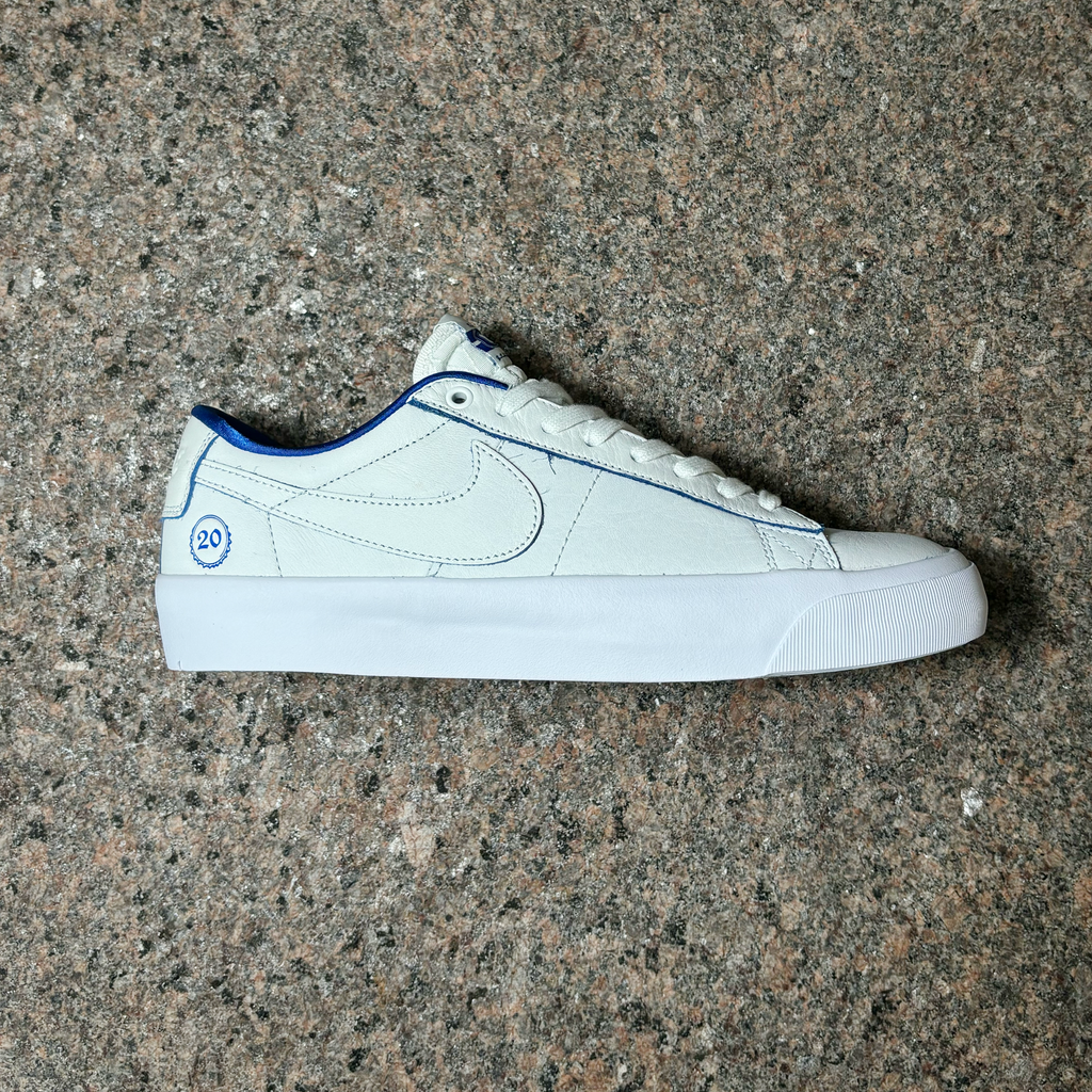  Side image of right shoe.
White/white leather with 