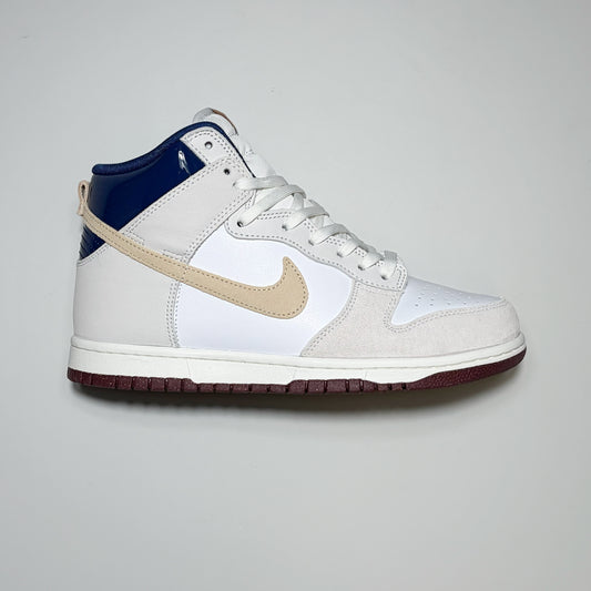 Right side image of Nike SB Dunk High Pro x Beyond Store. White, cream and navy blue heel collar.