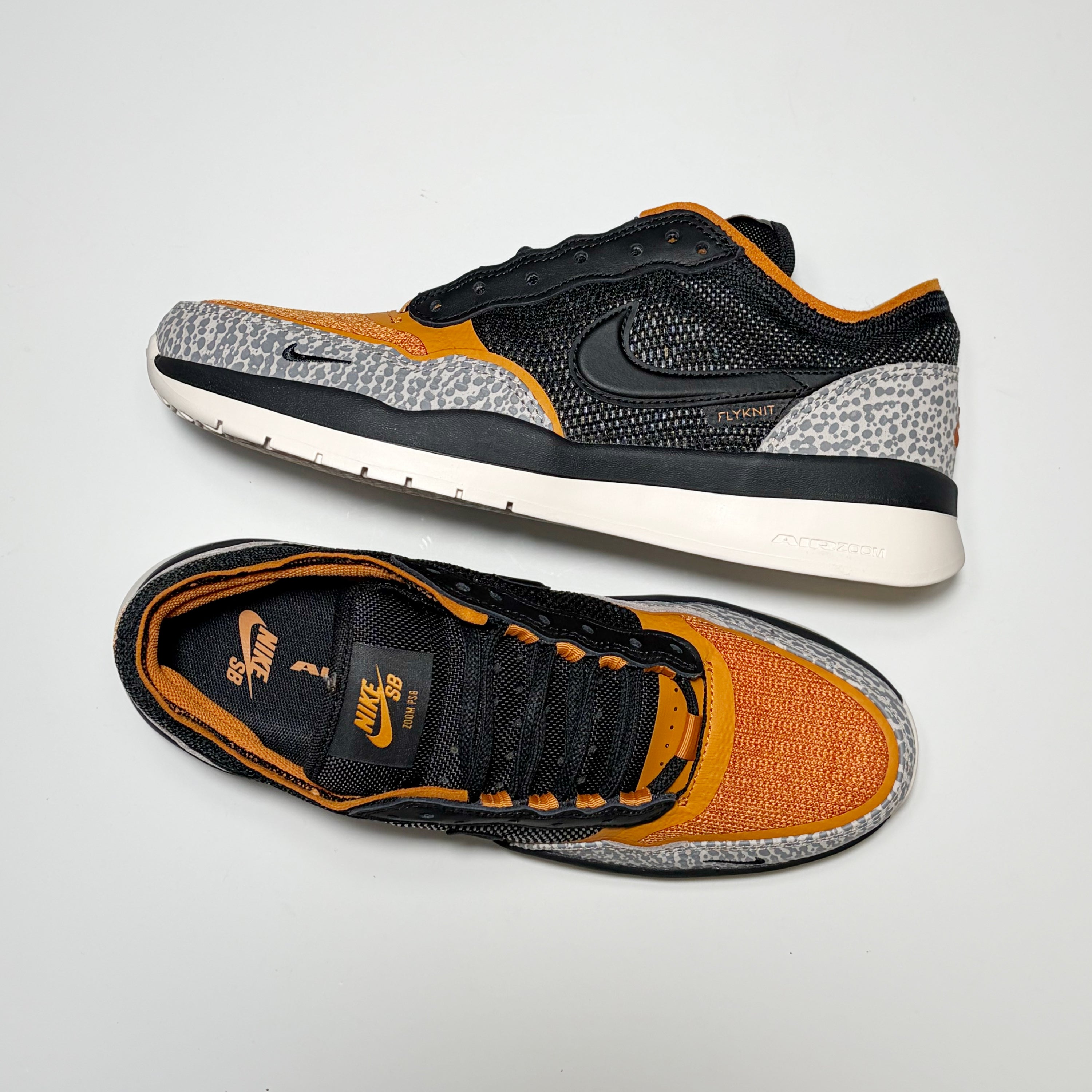 Pair of Nike SB PS8 premium skateboard shoes displayed on white background
