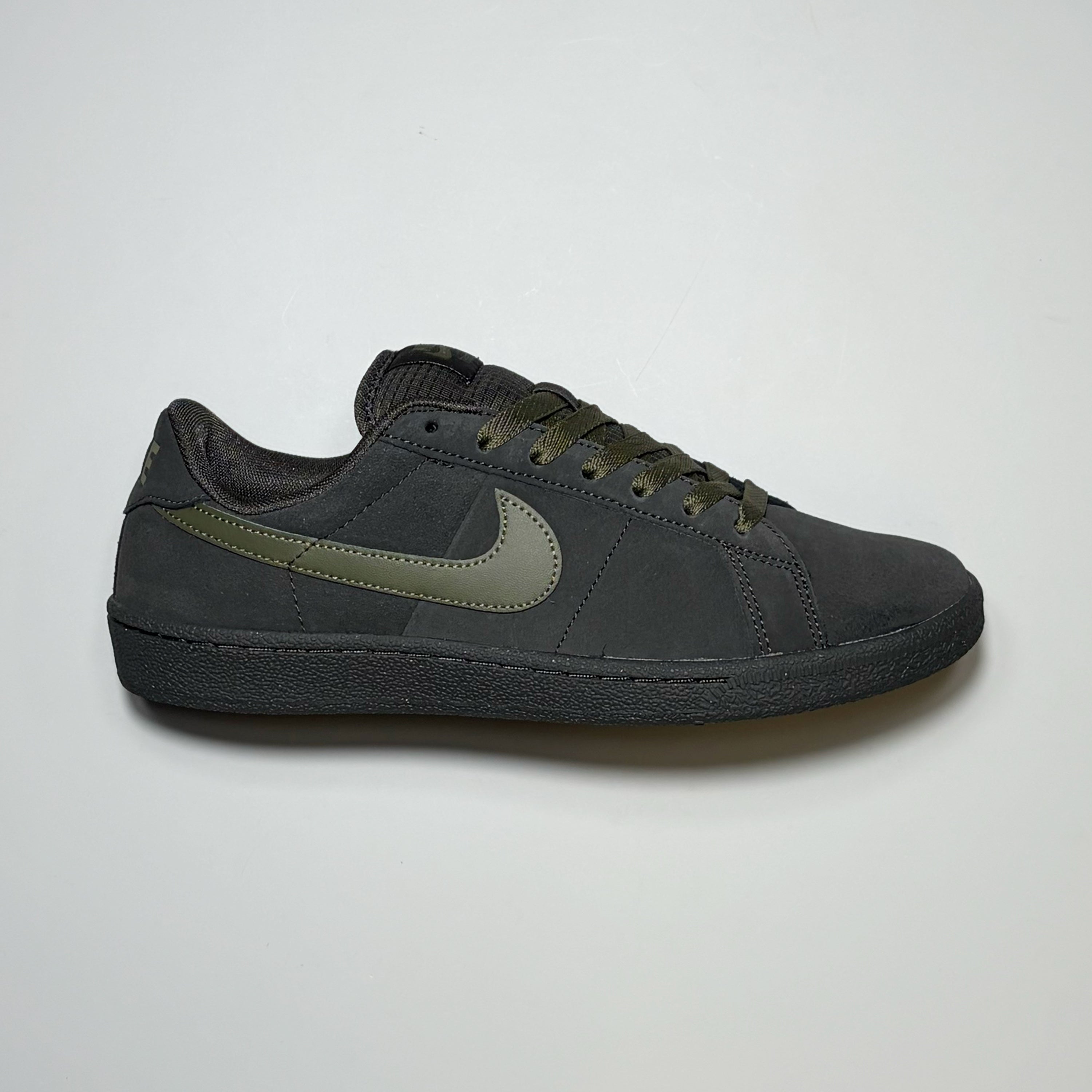 Right side image, Nike SB Zoom Tennis Classic shoe. Pewter grey and olive swoosh.