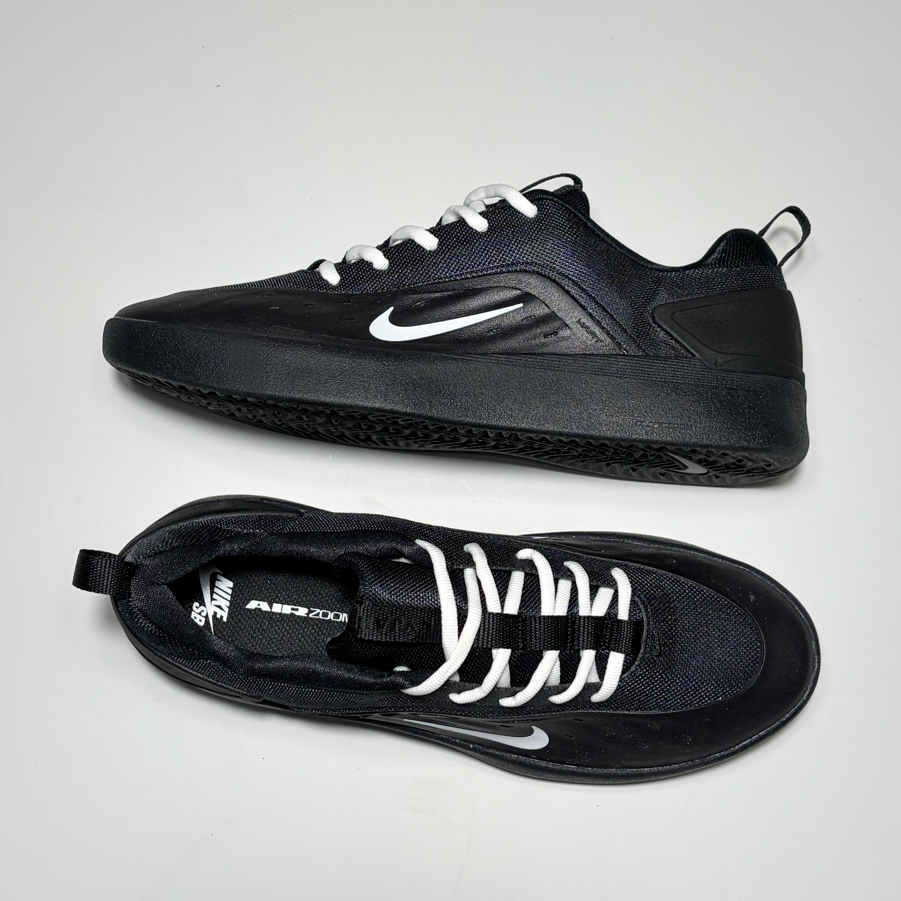 Toe down view with side profile.
Nyjah branding on tongue.