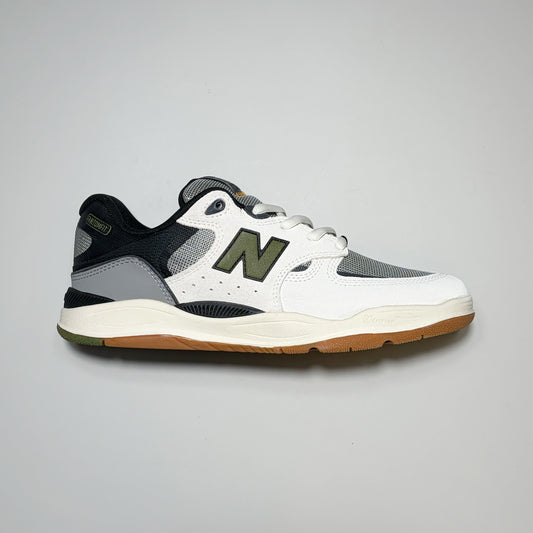 Right side image, white and grey panel new balance numeric nm1010 sneaker. 
Green "n" branding