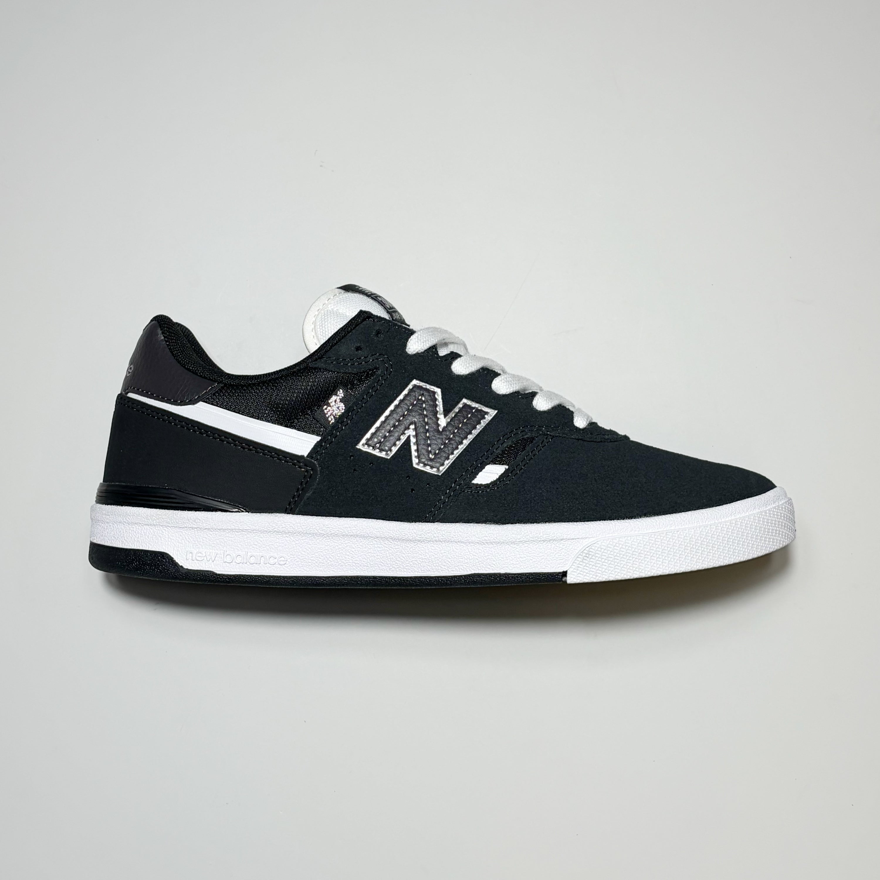 Right side image, New Balance Numeric NM306 Cupole Jamie Foy Pro model footwear in black/white suede.