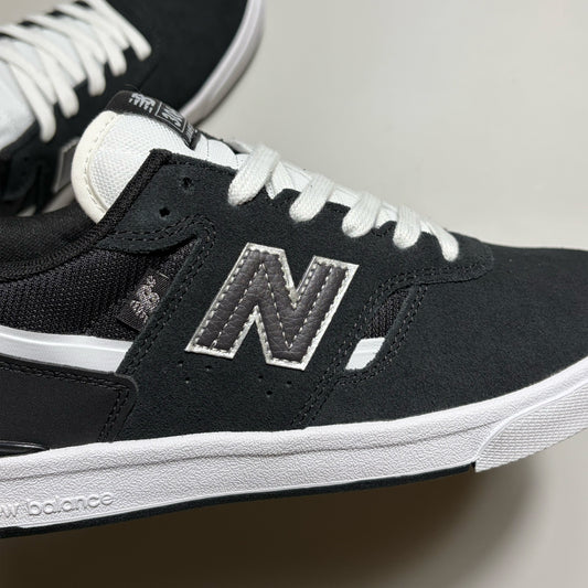 Close detail on "N" branding on mid-panel.