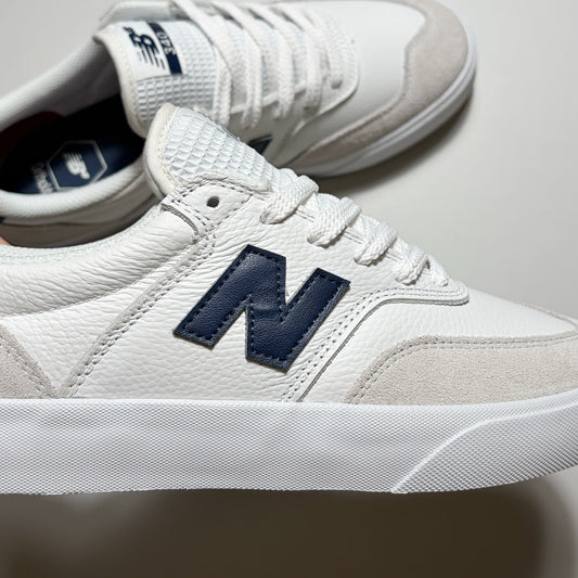 Close detail of navy "N" branding on mid-panel.