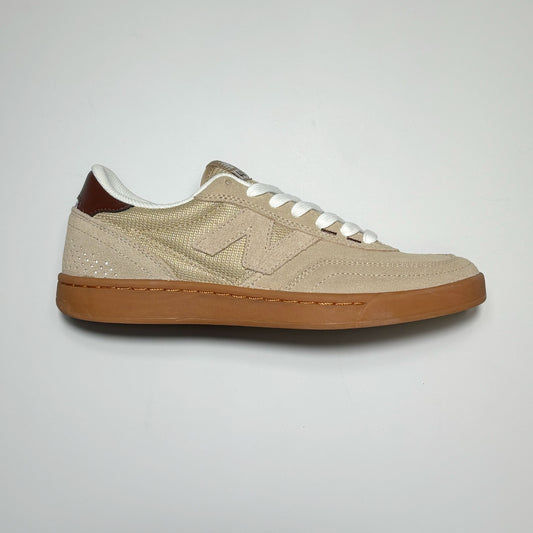 Side image of right shoe.
Tan suede with um outsole
