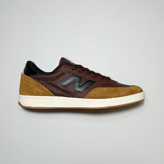 Right side image, New Balance Numeric NM440 shoe. Light brown suede with dark brown leather and white midsole.