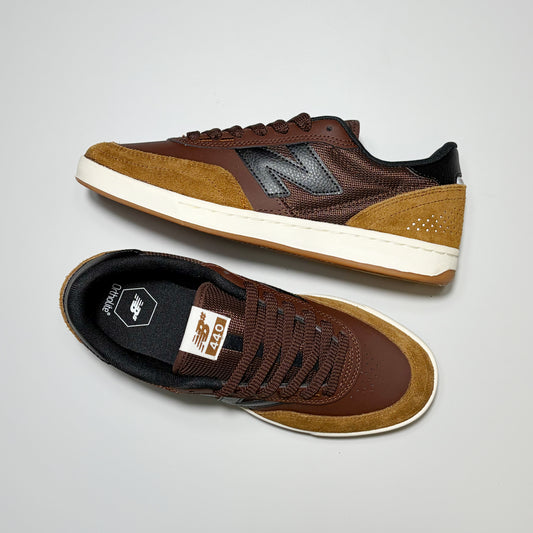 Pair of New Balance Numeric NM440 shoes on white background.