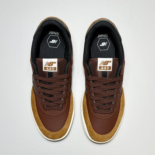 Toe down view, New Balance Numeric NM440v2 footwear. 2-tone brown with mesh tongue.