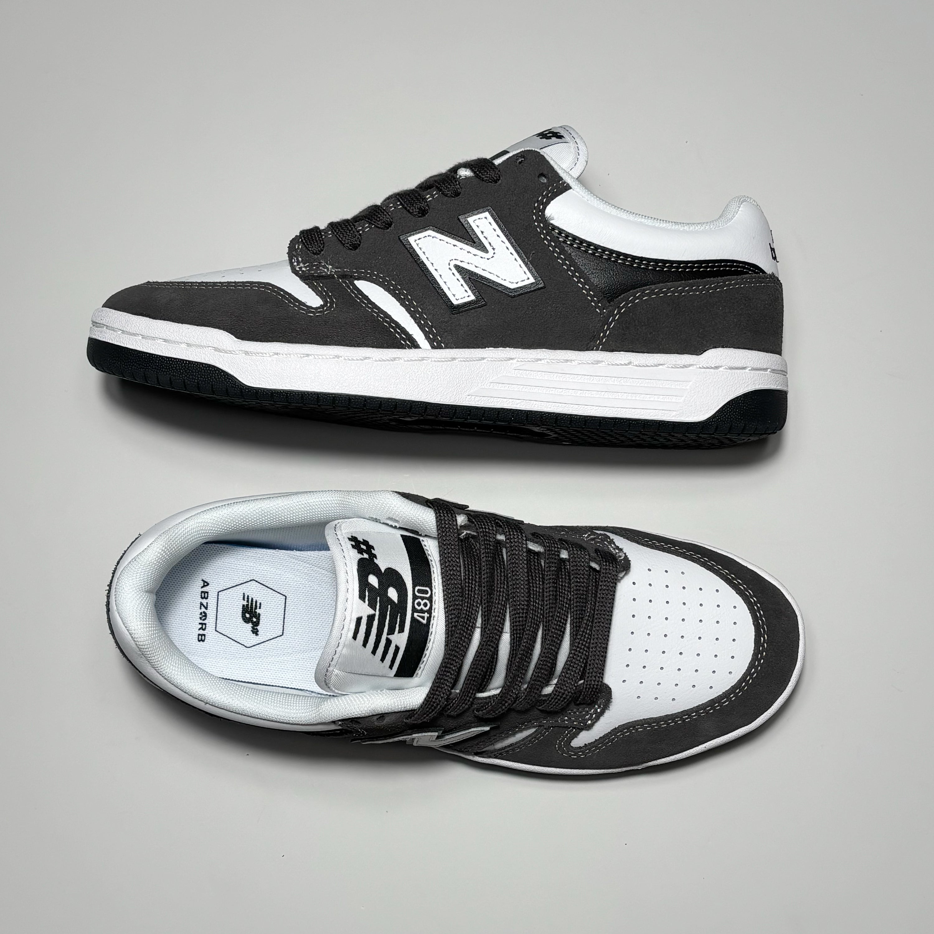 Toe down view with side profile. 
NB# 480 woven label on tongue.