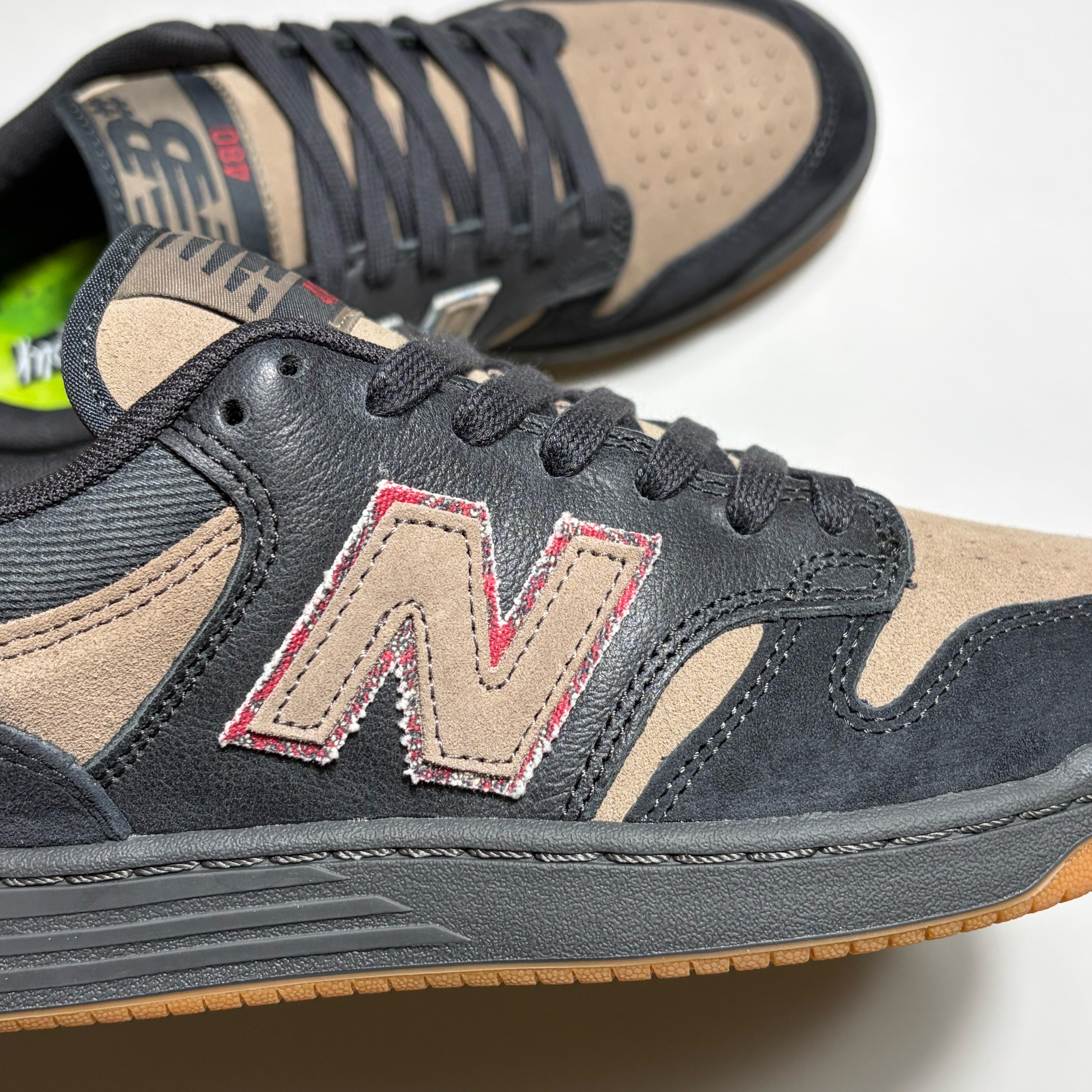 Close up detail of New Balance Numeric 480 "N' on mid panel 