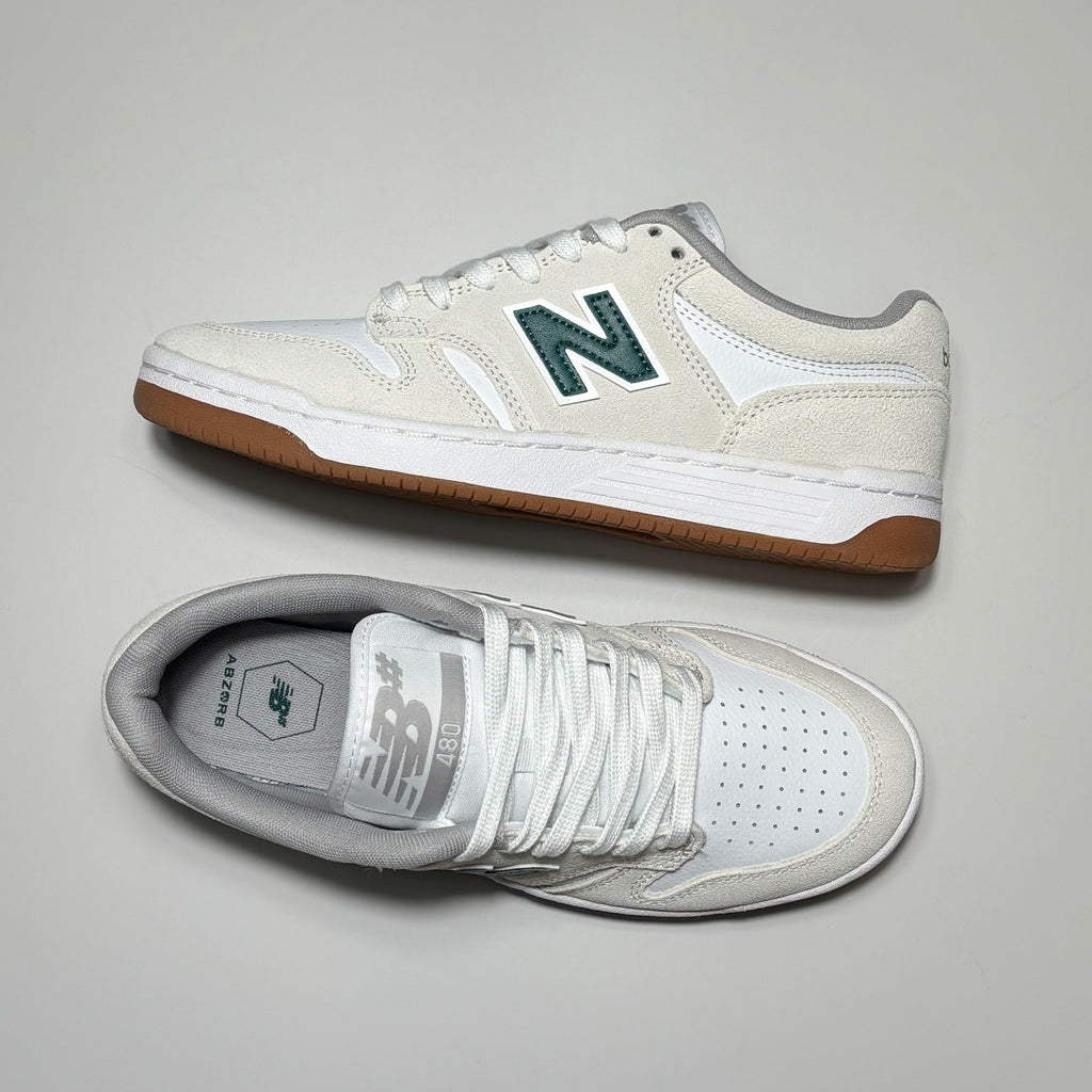 Toe down view with side profile.
Big NB# woven label on tongue