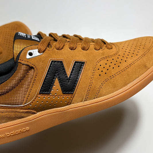 Close detail of "N" branding in black.