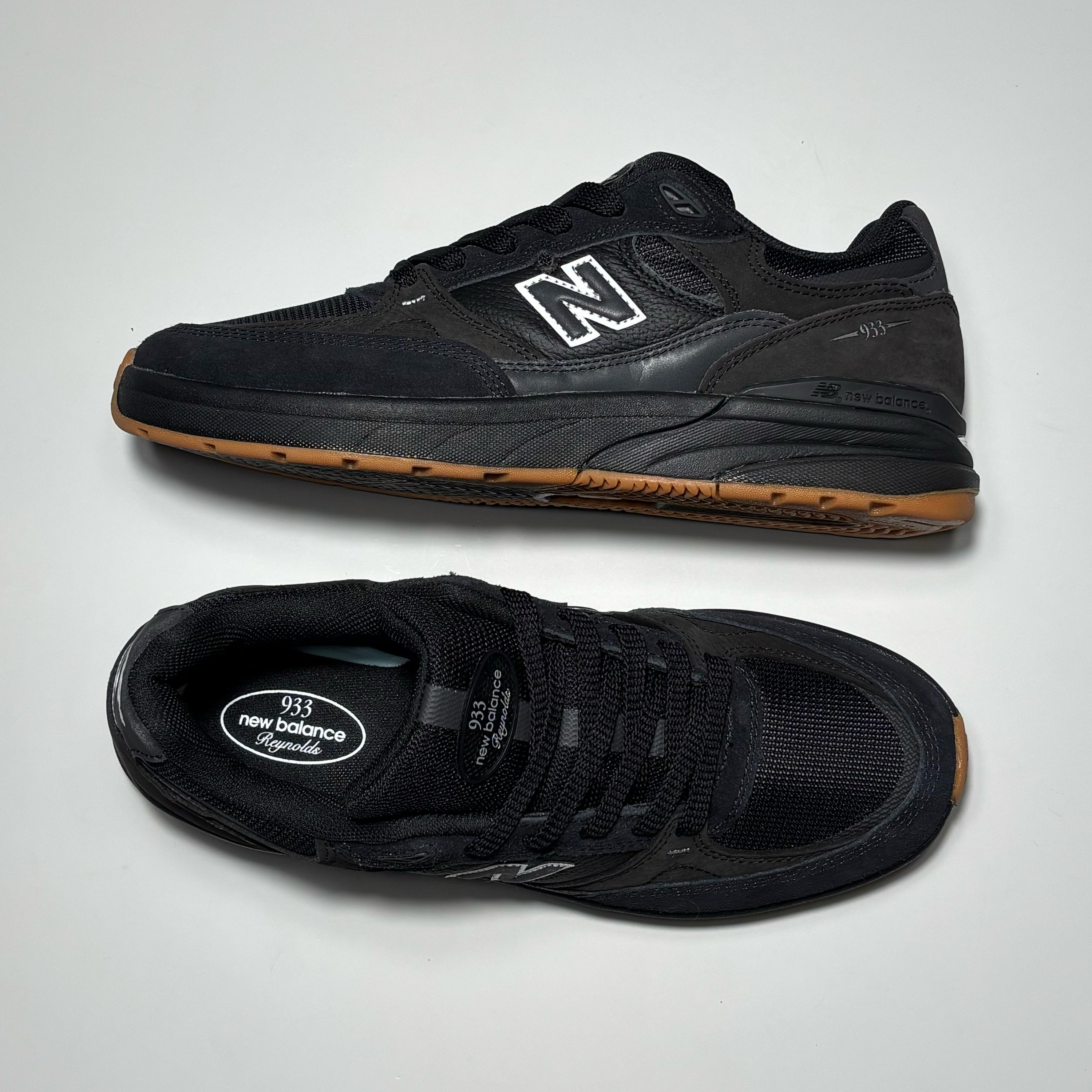 Toe down view with side profile. 933 Reynolds oval label on tongue.