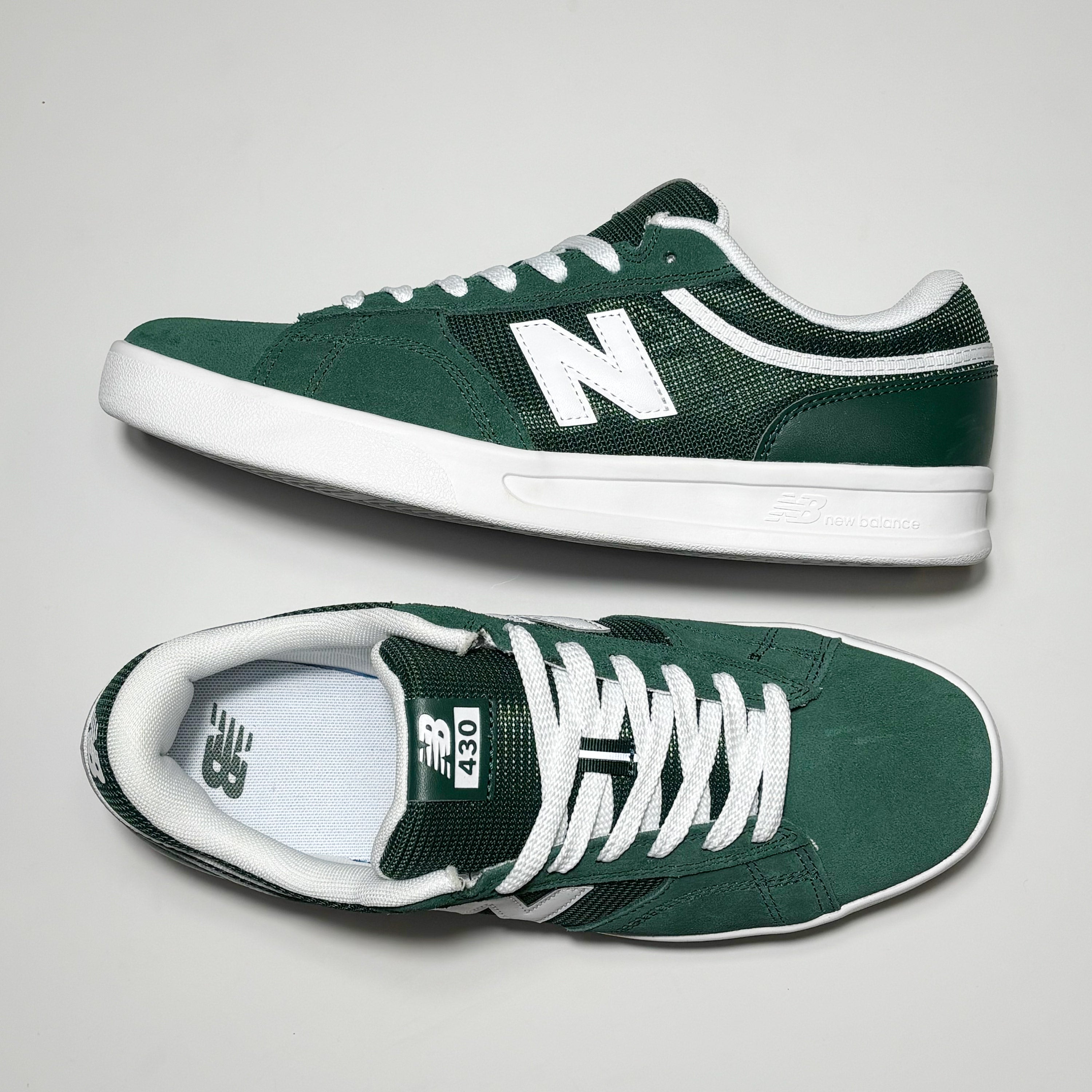 Toe down view with side profile.
NB430 label on tongue.