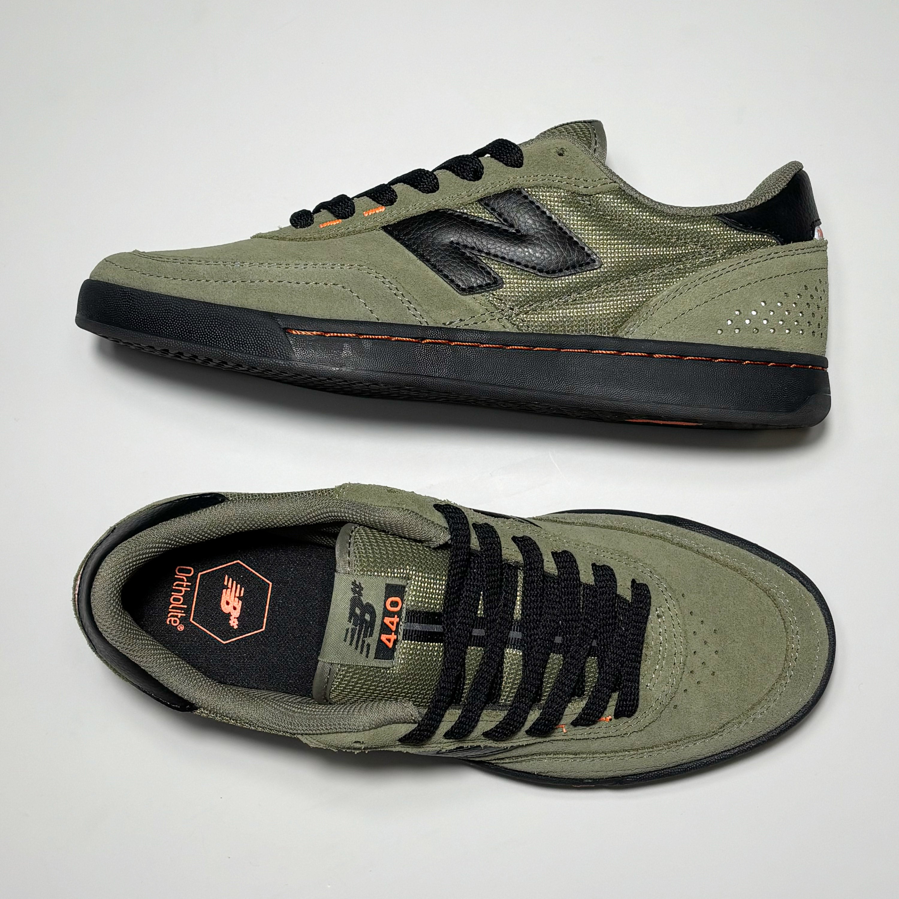 Toe down view with side profile.
NB440 label on tongue.