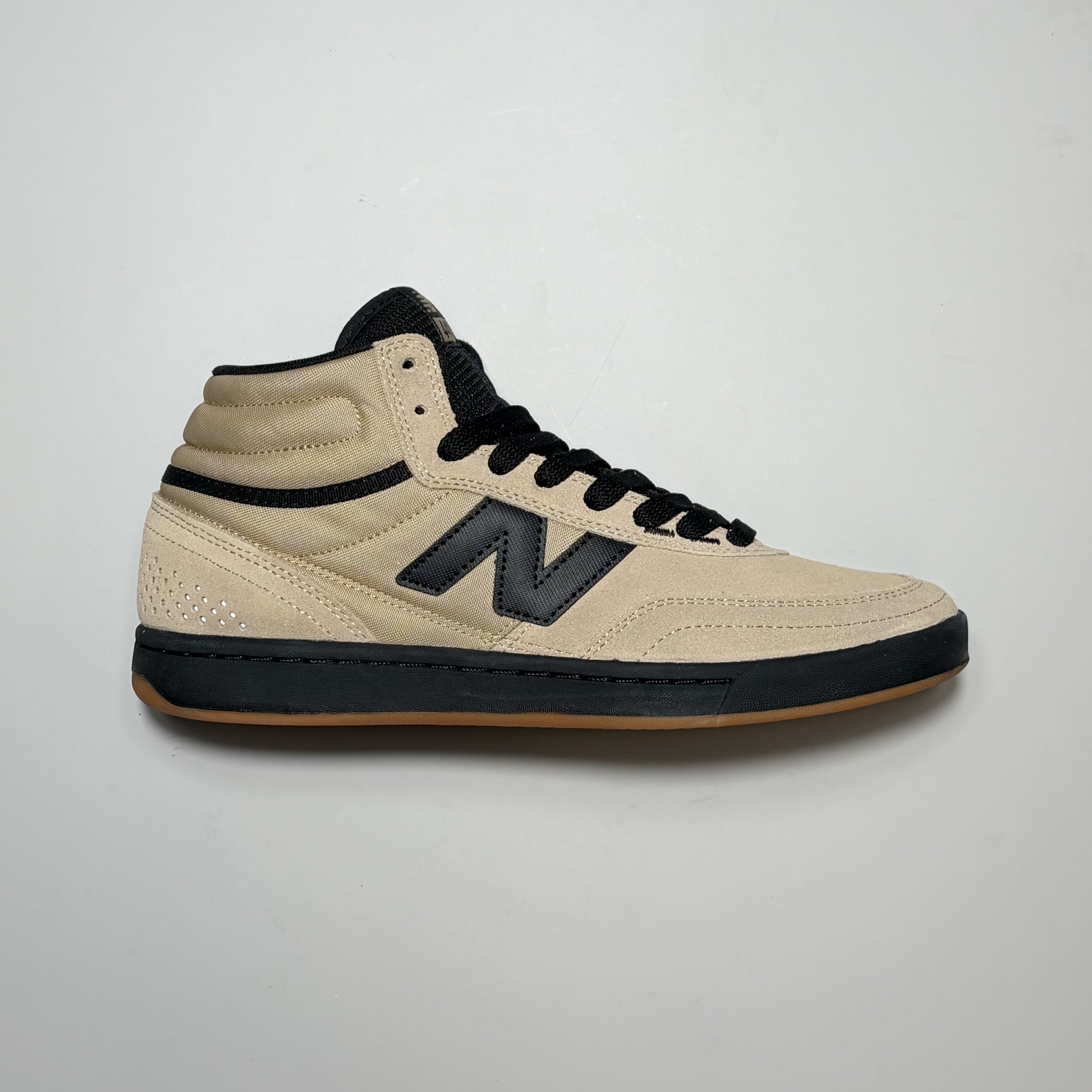 Right side image, New Balance Numeric NM440 V2 High. Brown with black 'N' and midsole on grey background