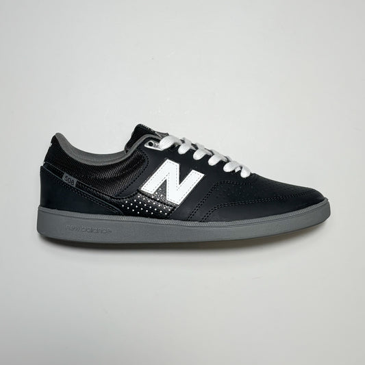 Right side image, New Balance Numeric NM508 shoes. Black nubuck with grey outsole and 'N' branding in white.