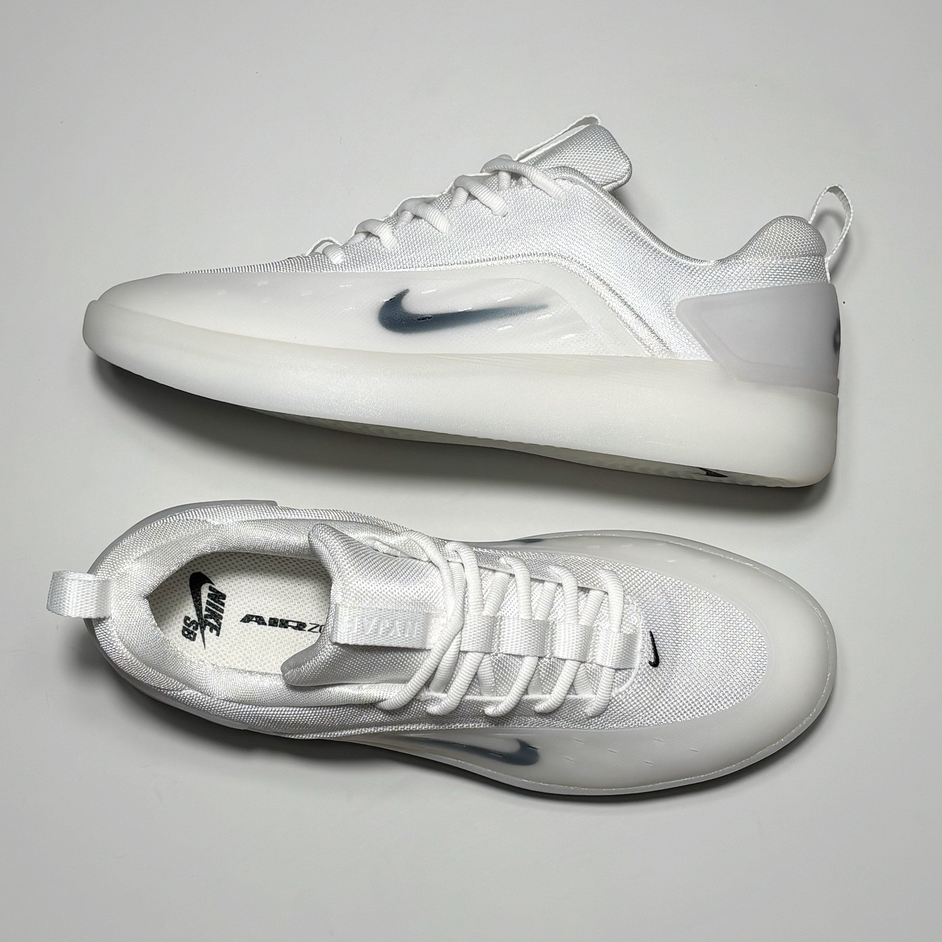 Toe down view with side profile. 
Nyjah woven label on tongue.