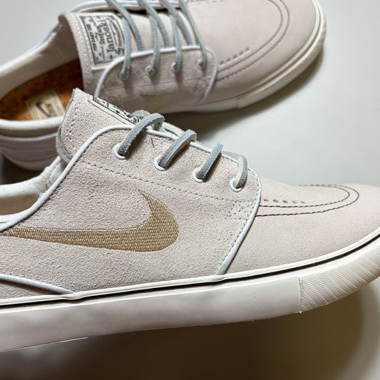 Close detail of suede, leather laces and contrast stitching.