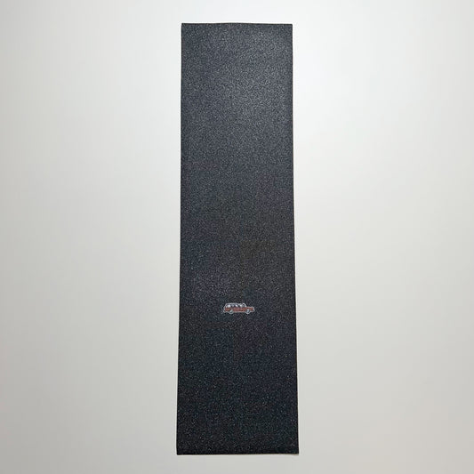 Full image of black griptape with red wagon art by tail