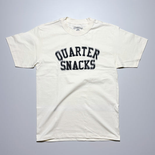 Front image of cream tee with art printed on chest.