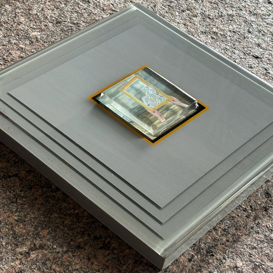 Close detail of artwork with custom 3D layered epoxy resin.