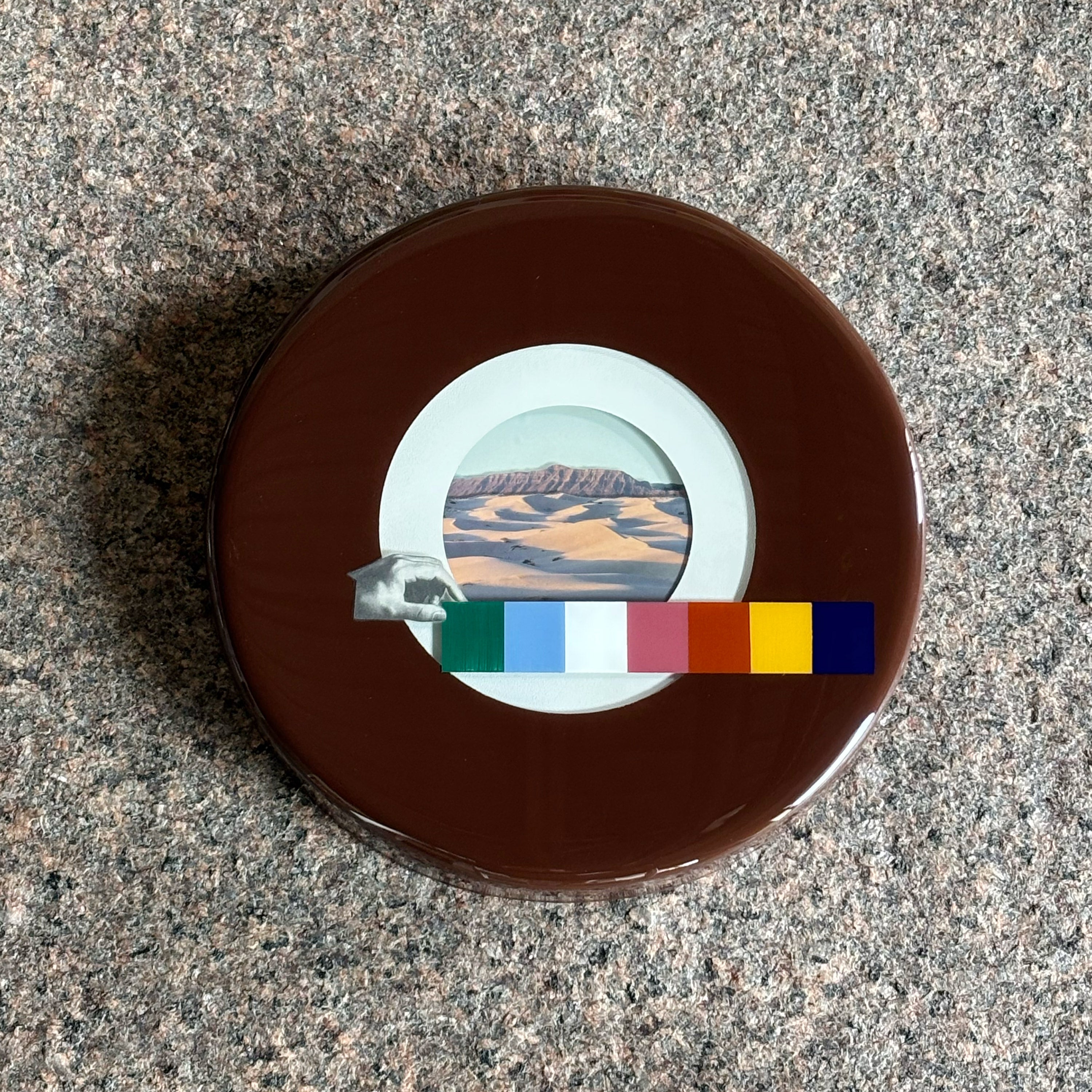 Round framed art. Collage artwork with custom epoxy resin. 