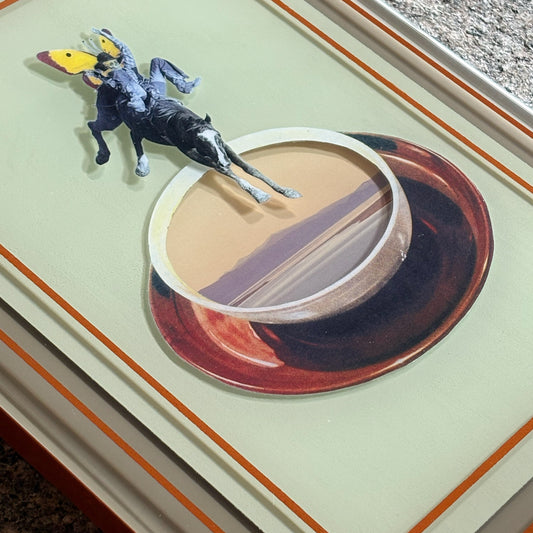 Close detail of the collage artwork, encased by custom epoxy resin.