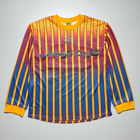 Front image of gradient striped jersey.
Orange to blue with black printed art on chest.