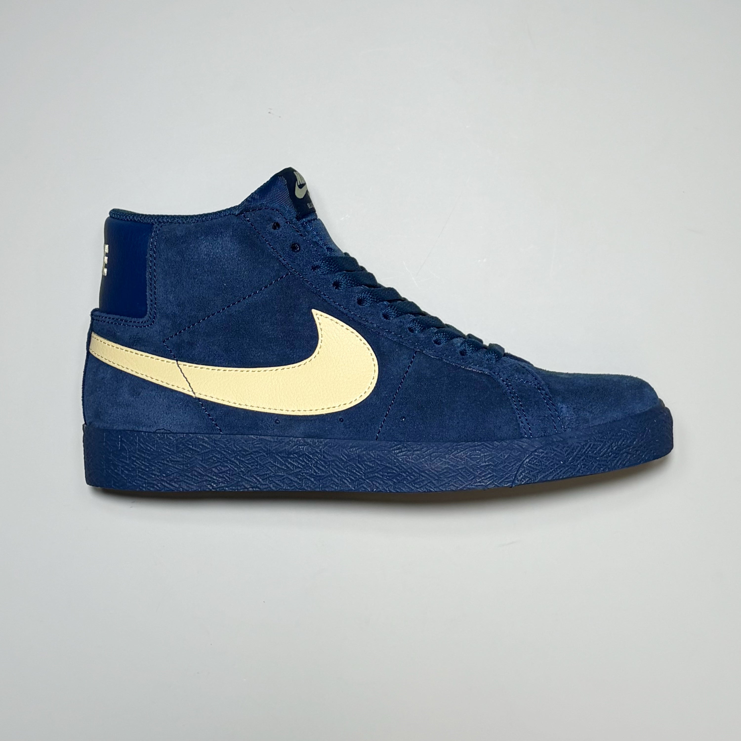 Right side image, Nike SB Zoom Blazer Mid in coastal blue suede with pale yellow swoosh