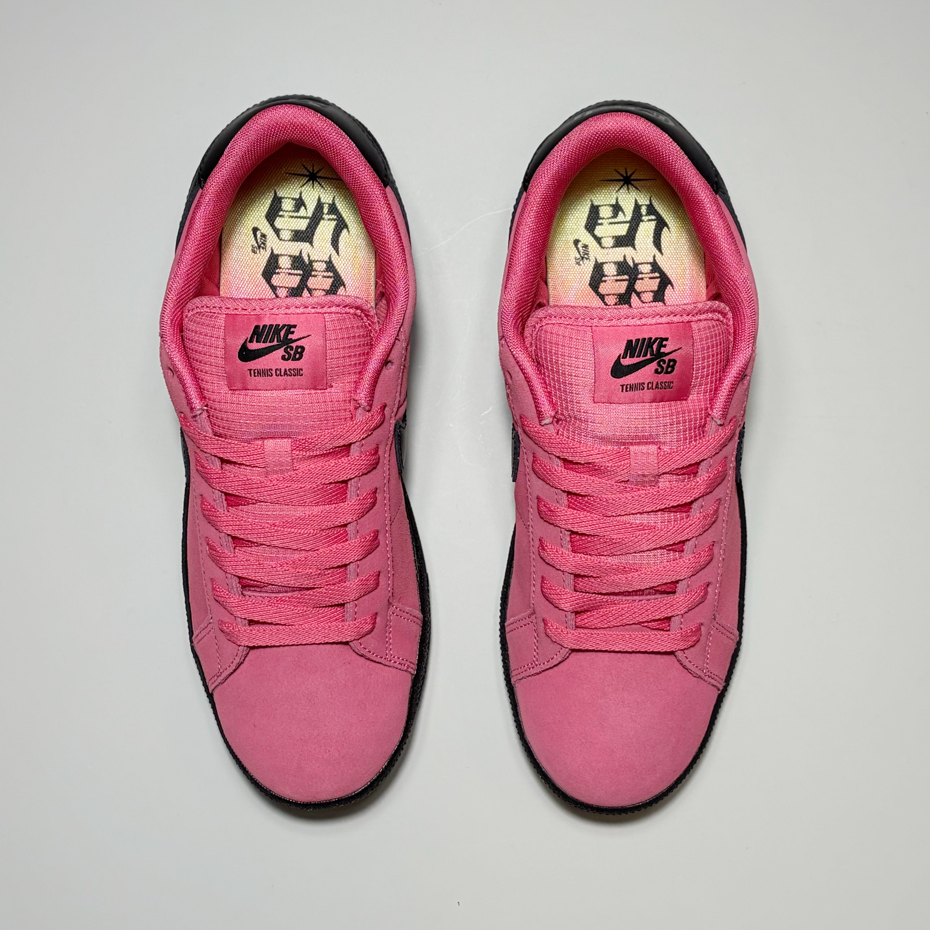 Toe down view of pair, Nike SB Zoom Tennis Classic footwear. Custom SB sockliner with SB FC fade color