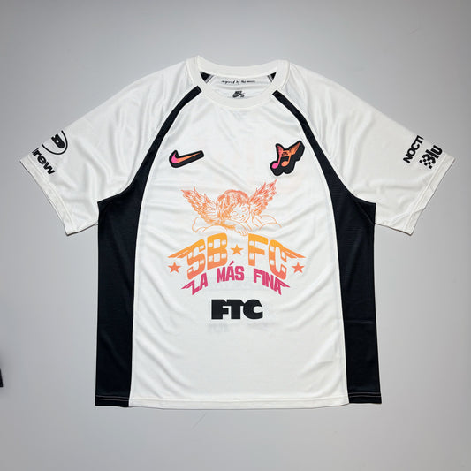 Full front image, Nike SB FC club 58 jersey. Art printed on front and sleeves with embroidered patches on chest.
