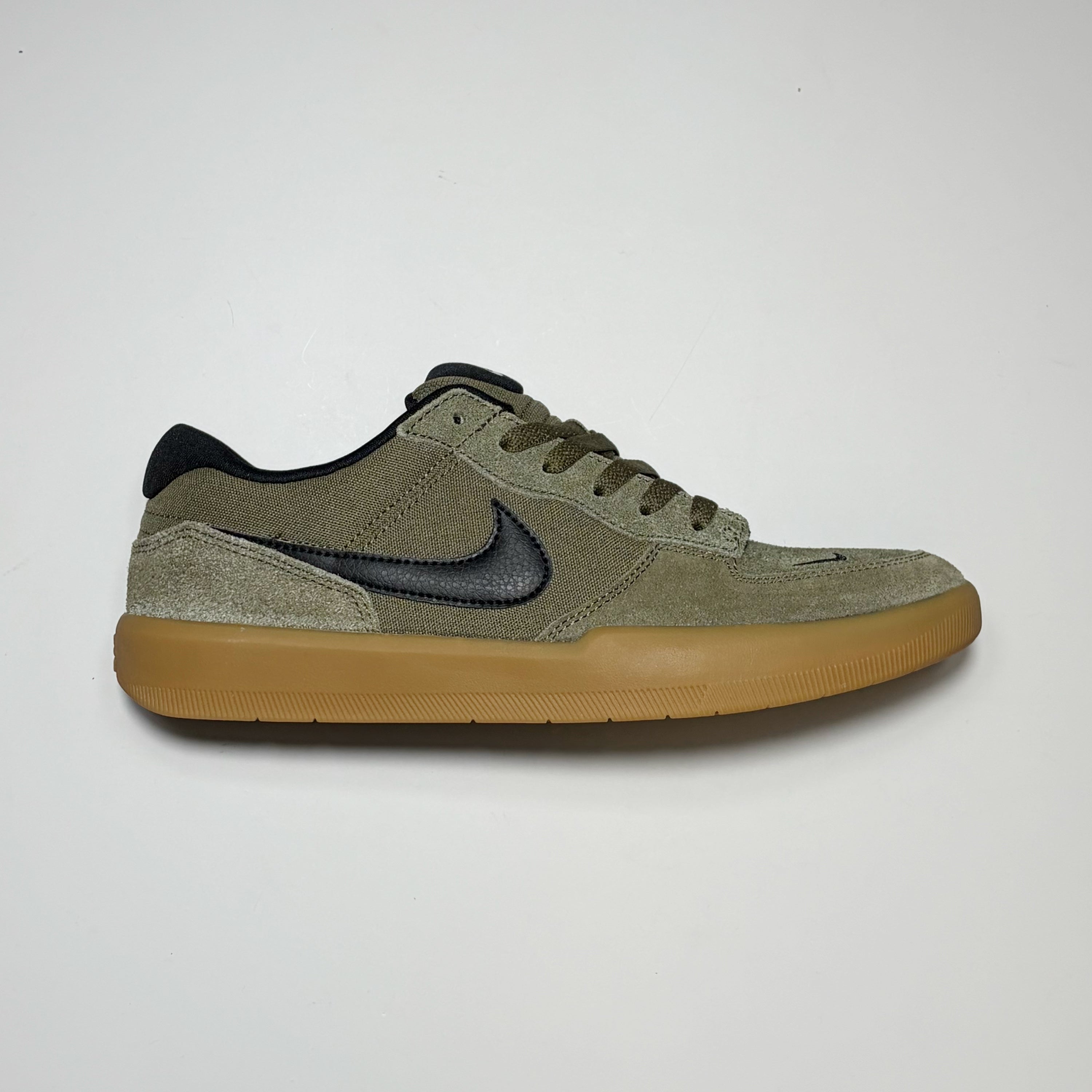 Right side image, Nike SB Force 58 in olive suede with gum sole.