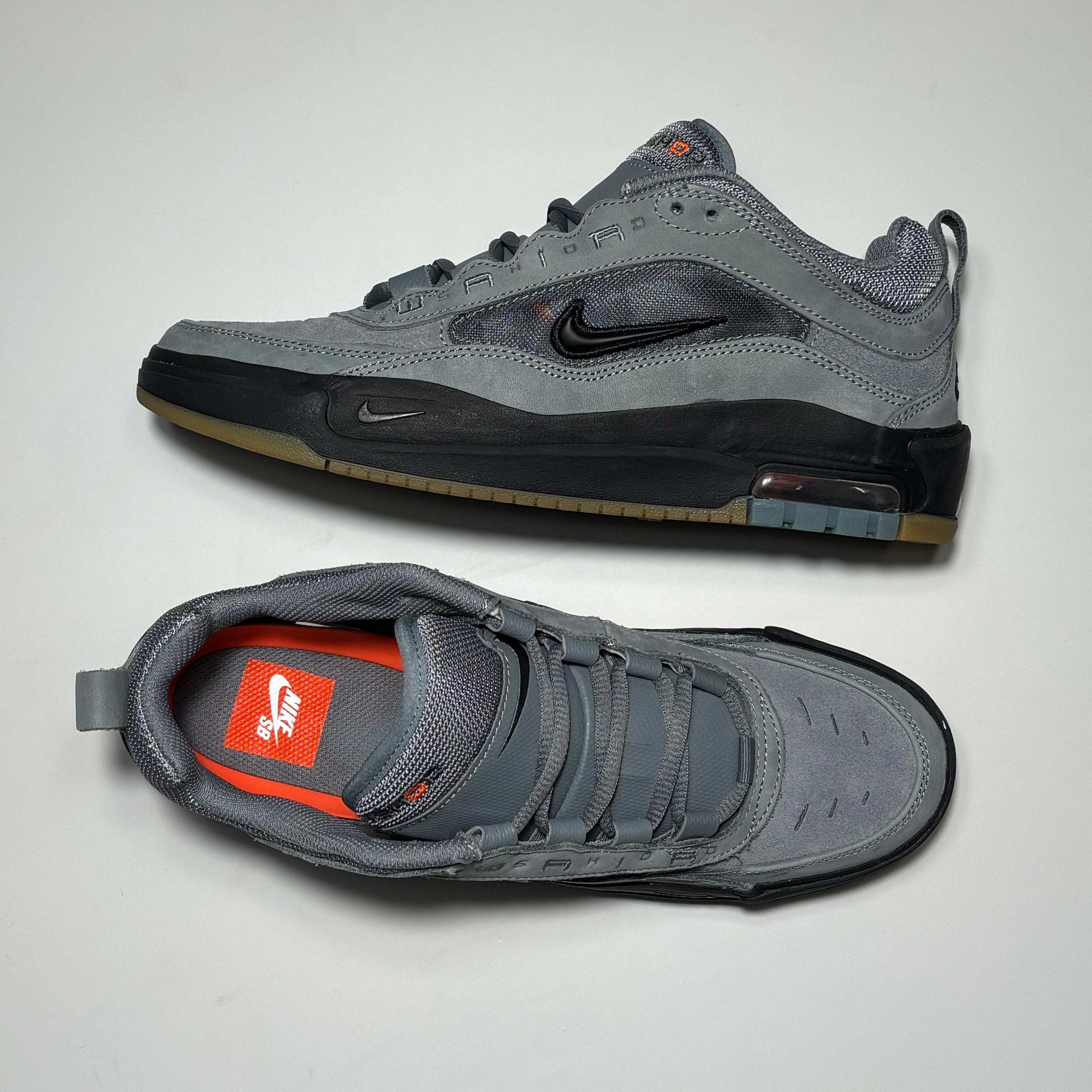 Toe down view with side profile.
Orange O woven font on tongue.