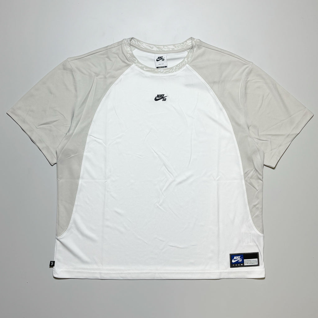 Full front image of white with bone color blocked jersey. Nike SB logo embroidered on chest.